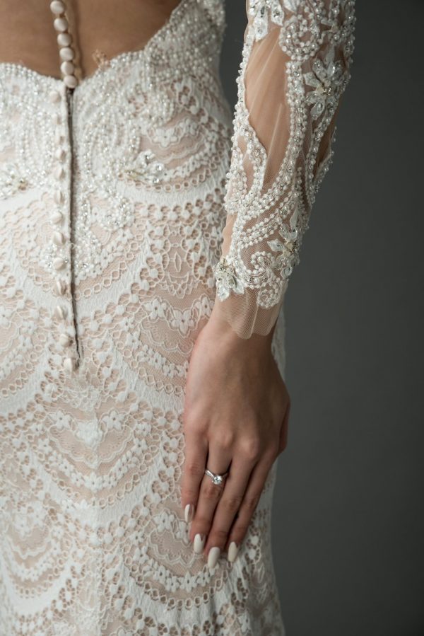 spanish lace fitted wedding gown, beaded sleeves