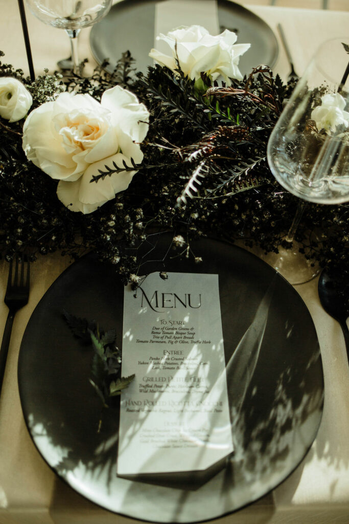 matte black and white wedding color table scape