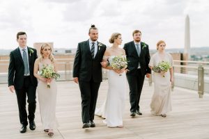 classic wedding bridal party looks champagne and black