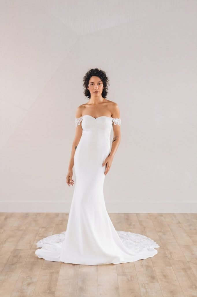 Ivory crepe wedding dress. off the shoulder. elegant gowns.