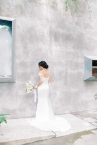 silk satin wedding dress buttons down the back off the shoulder
