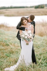 crepe wedding gown by grace + Ivory big fake wedding white florals