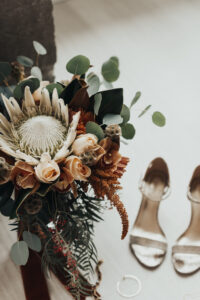 bridal shoes with bridal bouquet