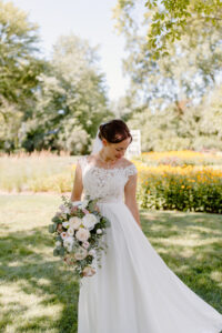 customizable wedding dresses: flowy skirt with lace off the shoulder top