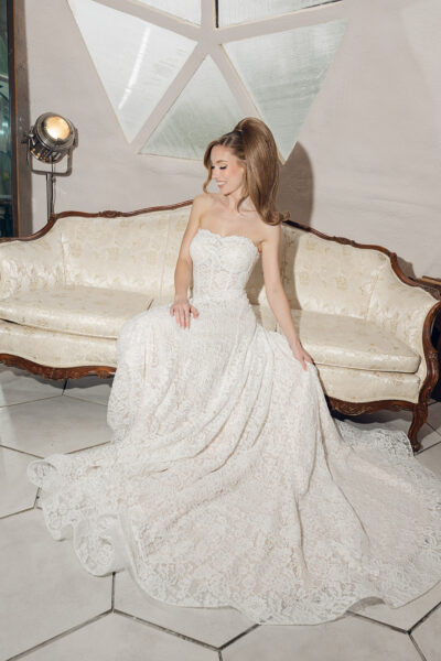 strapless lace wedding dress; vintage inspired lace, blush undertones, basque waist.