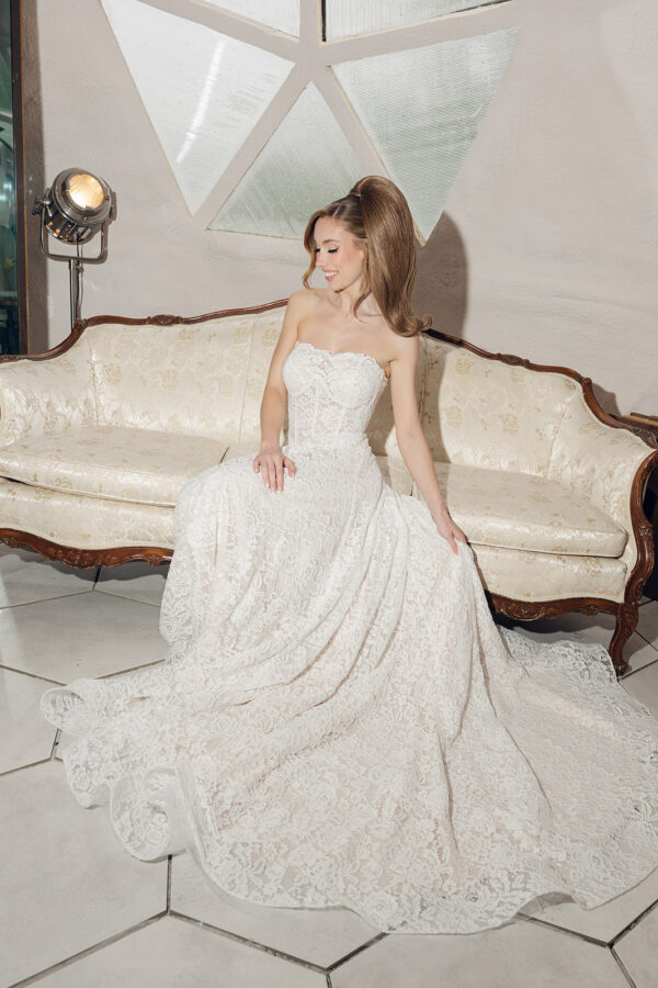 strapless lace wedding dress; vintage inspired lace, blush undertones, basque waist.