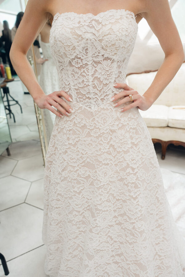 strapless lace wedding dress; vintage inspired lace, blush undertones, basque waist.